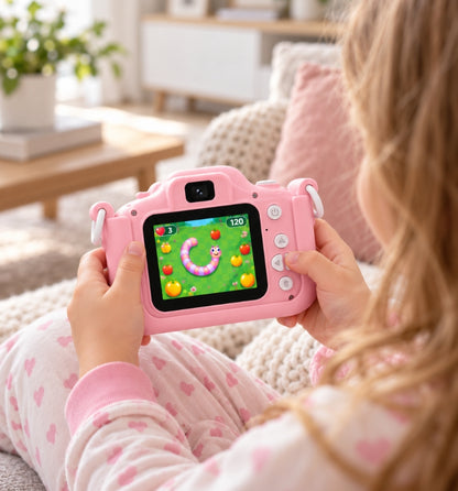 Girl playing a built-in game on the Klikko Stella kids camera at home